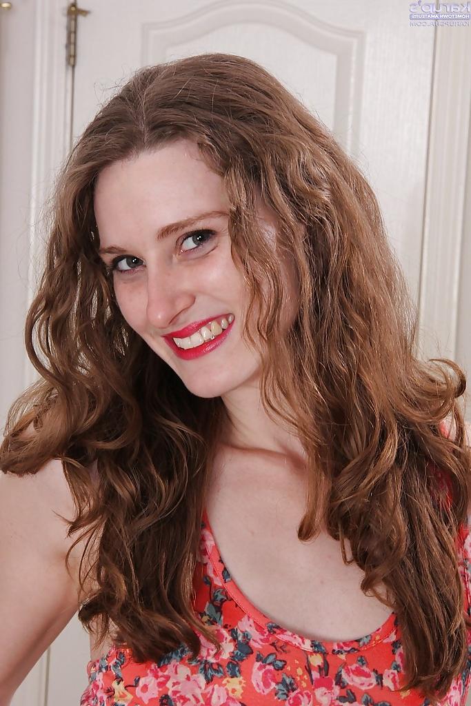 16P Leggy teen amateur Tara Estell showing off pierced pussy after stripping naked