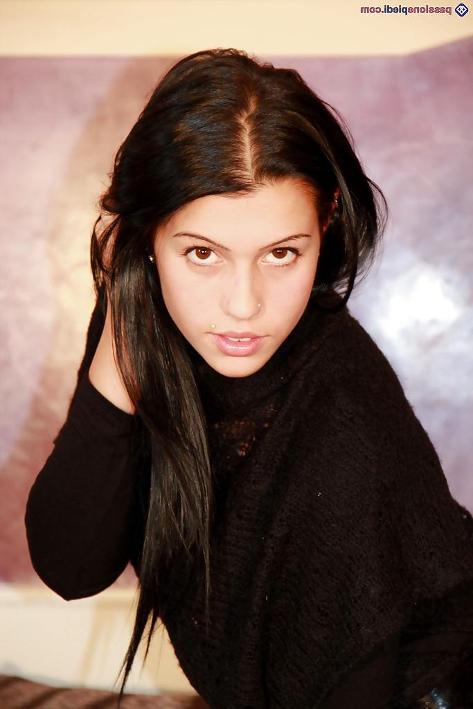 16P Babe in jeans Petra likes to play with her feet and show her body