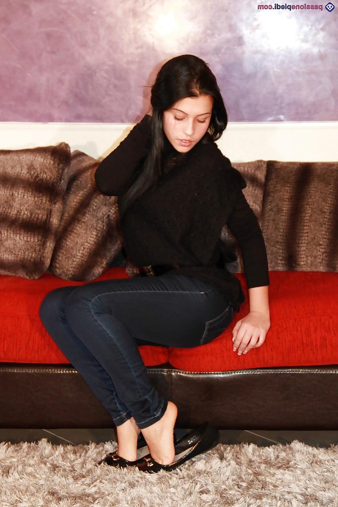 16P Babe in jeans Petra likes to play with her feet and show her body
