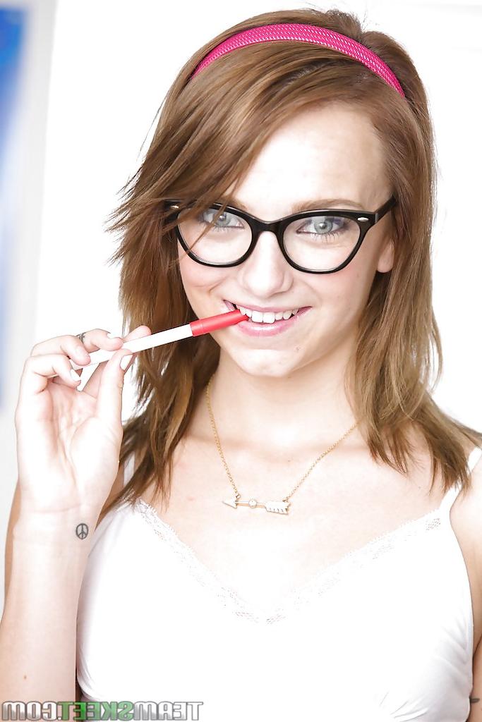 16P Perky schoolgirl in glasses undressing and exposing her slippy curves