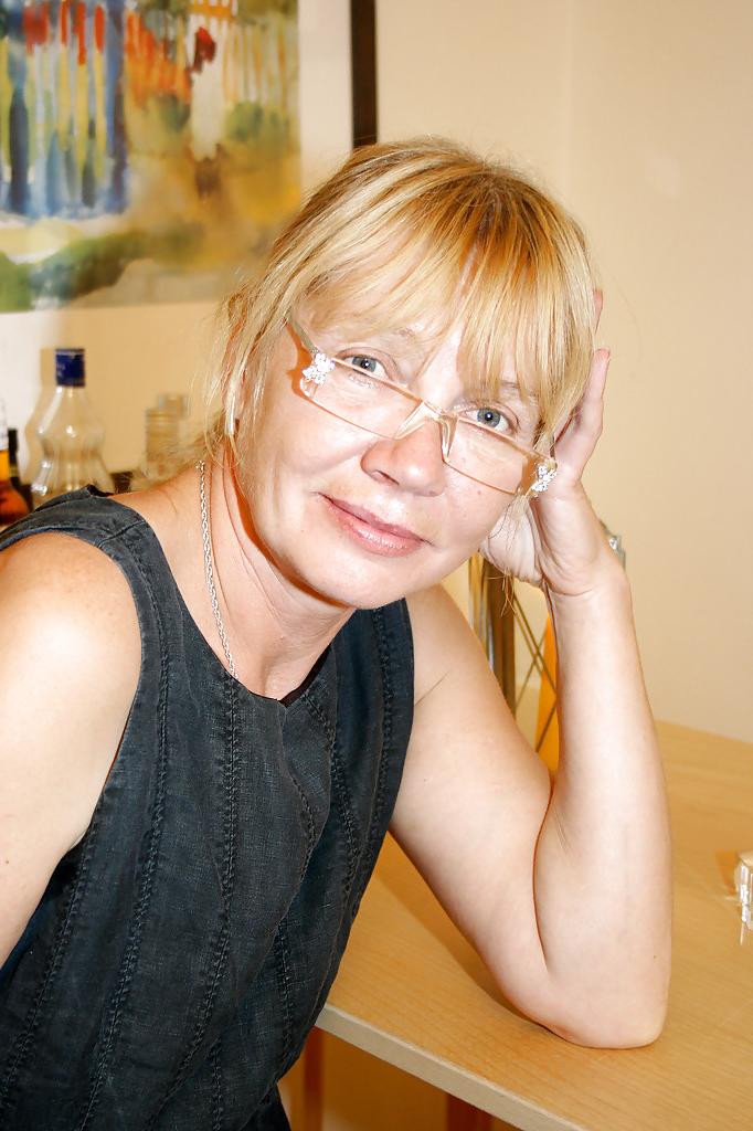 16P Chubby granny in glasses Sandra AA stripping off her dress and panties