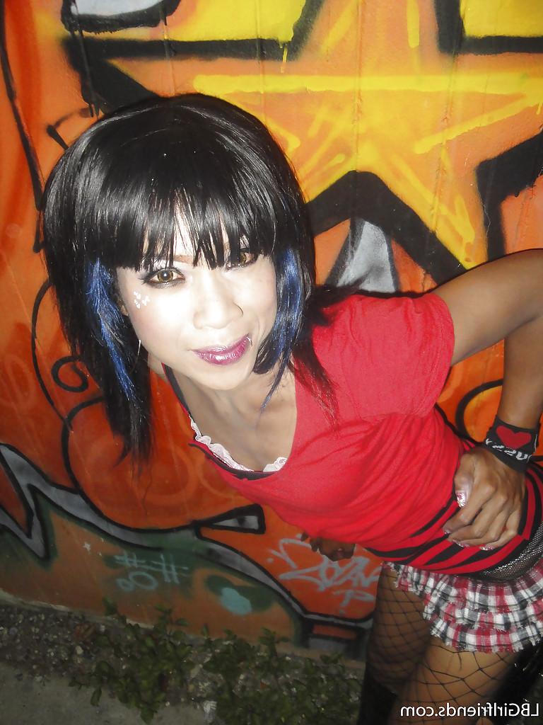 16P Cute Thai tranny teen Leena posing outdoors and getting really nasty