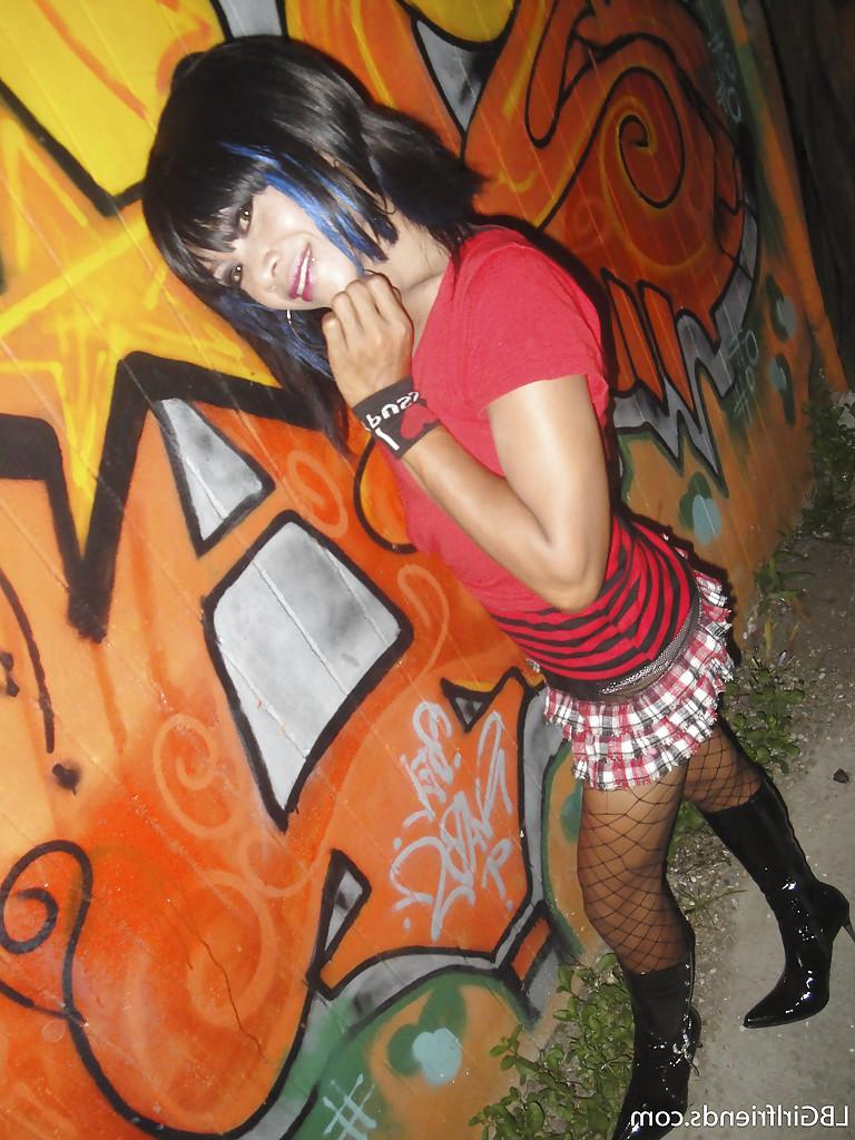 16P Cute Thai tranny teen Leena posing outdoors and getting really nasty