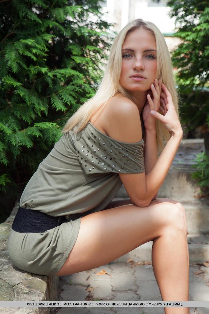 18P Young blonde female Jaime A stripping off clothes to model naked outdoors