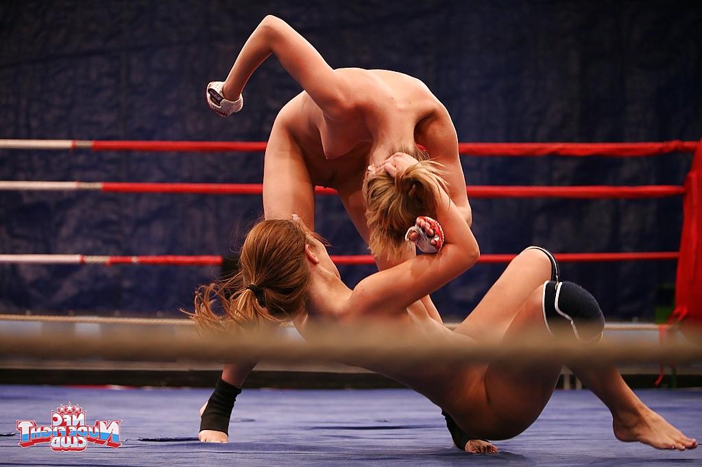 16P Sporty lesbians grasping each other and licking each other's cunts