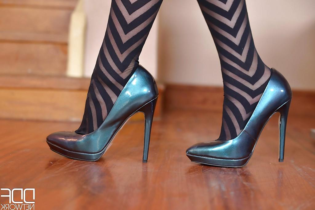 16P Beautiful solo girl Mira Sunset removing high heels from stocking attired feet