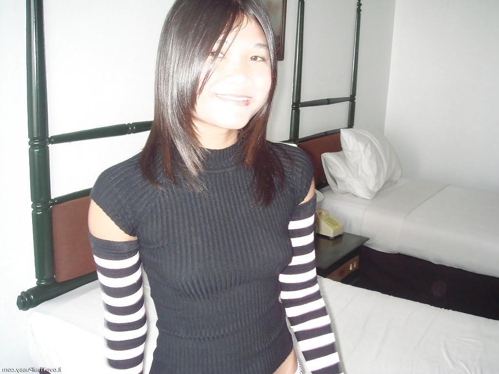16P Young asian girl exposing her tiny tits and trimmed juicy cunt