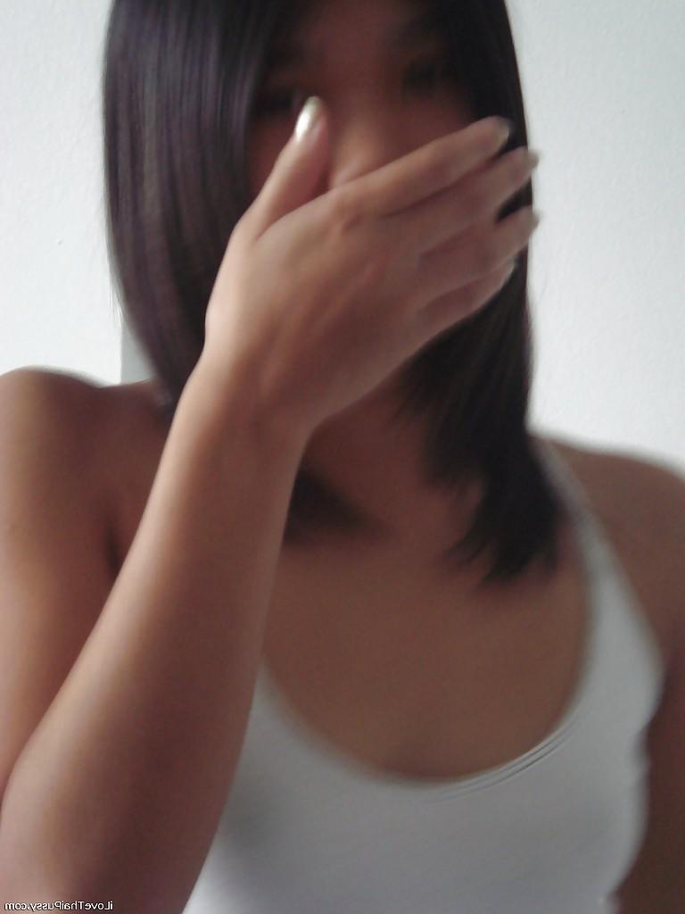 16P Young asian babe with small tits stripping and showing off her juicy twat
