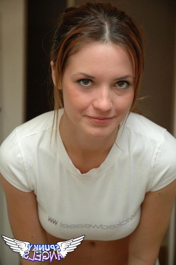20P Pictures of a cute teen teasing in the kitchen