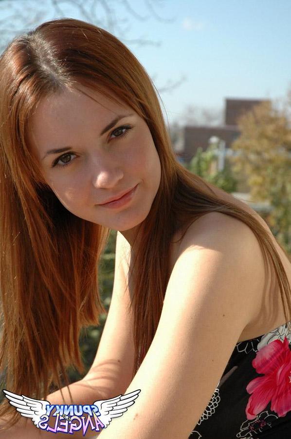 20P Pictures of a cute teen teasing outside