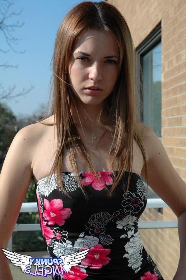 20P Pictures of a cute teen teasing outside