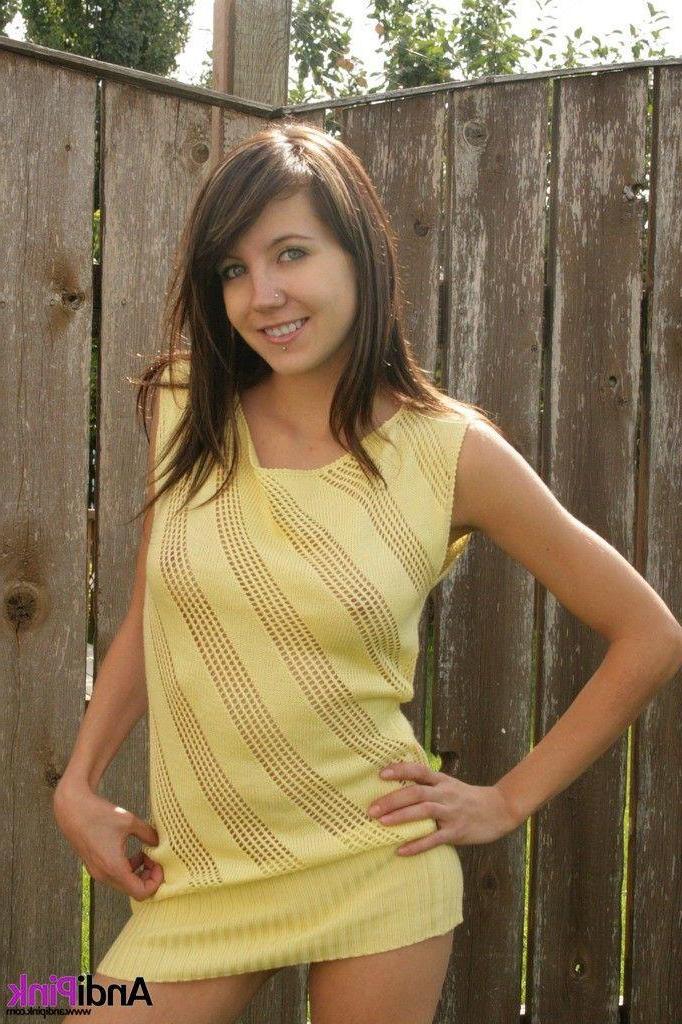20P Pictures of Andi Pink taking her clothes off in the back yard