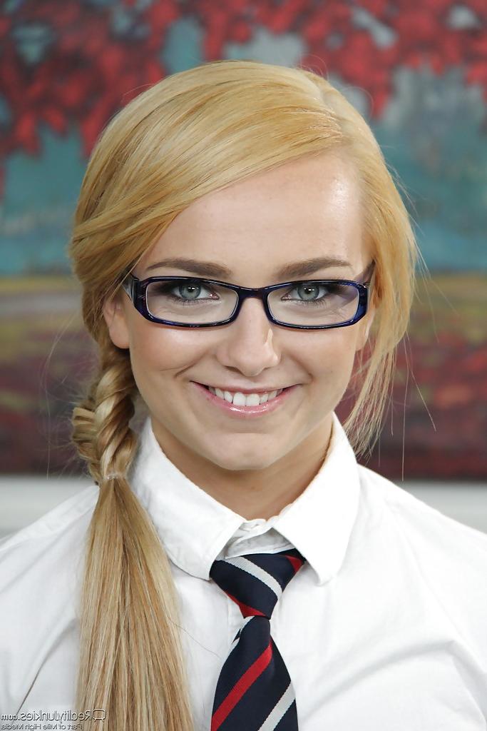 16P Smiley schoolgirl in glasses and checkered skirt uncovering her sexy body