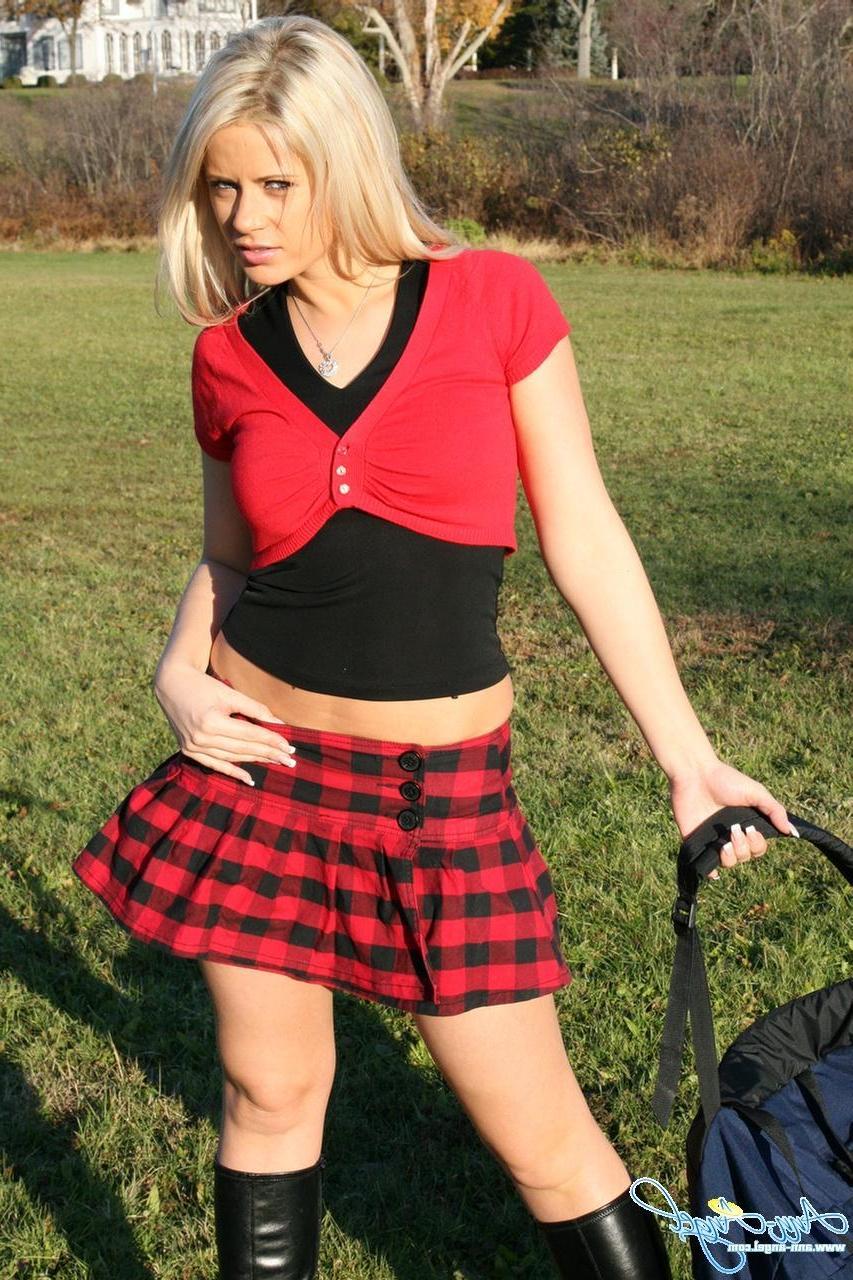 16P Pictures of Ann Angel looking hot in a red schoolgirl outfit