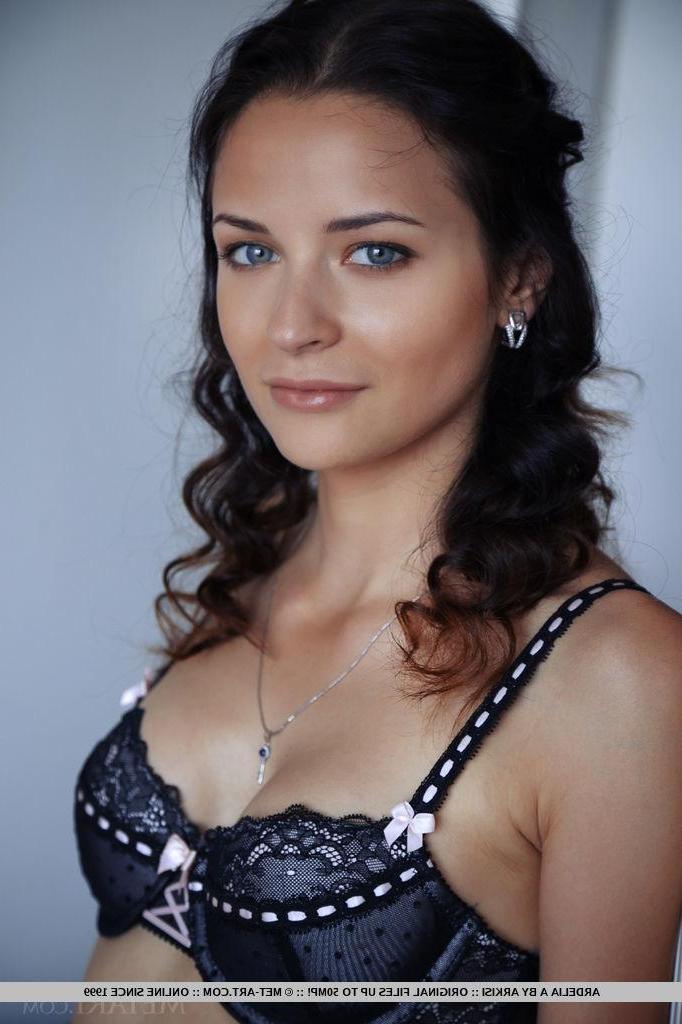 18P Ardelia A shows off her slender body and tight pussy on the couch
