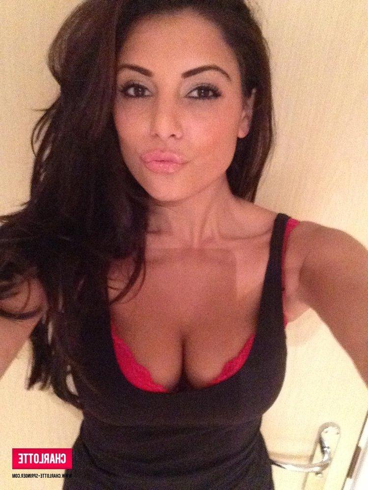 12P Charlotte strips from her tight top and red lingerie