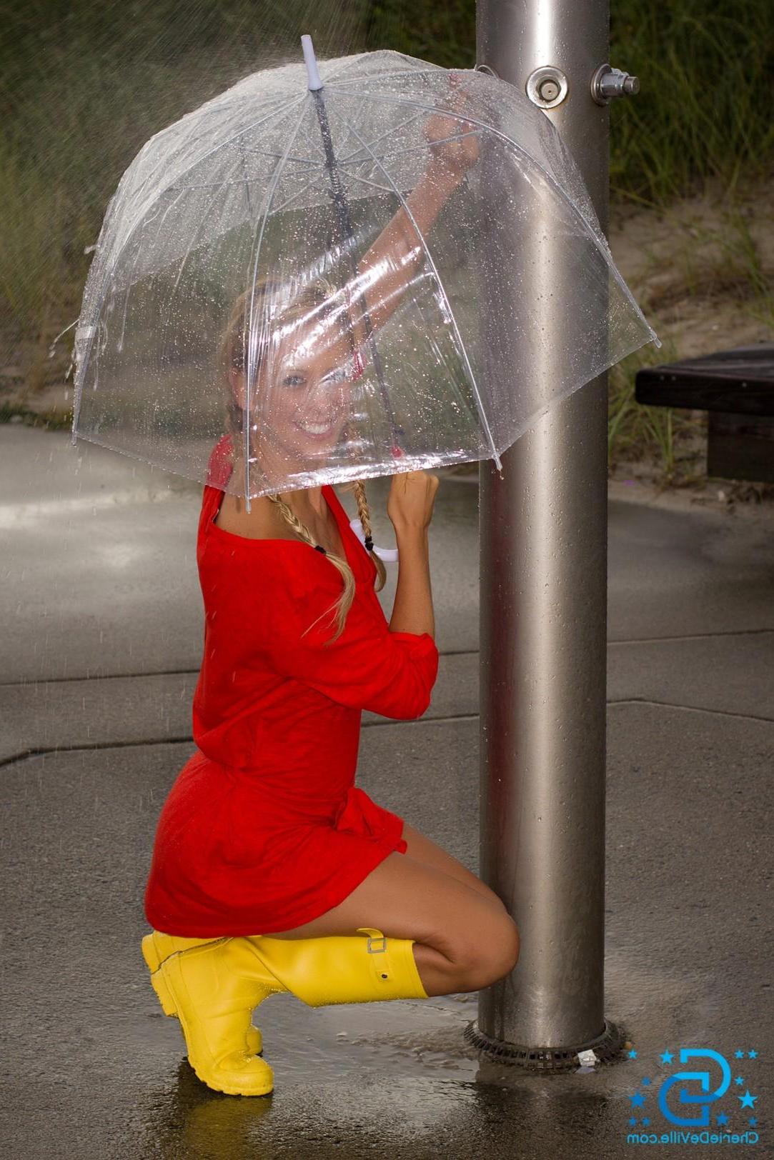 14P Busty blonde babe Cherie Deville has some naughty fun in the rain