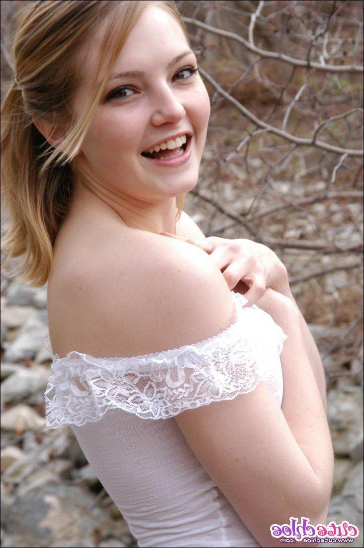 13P Pictures of Cute Chloe doing a strip tease outside