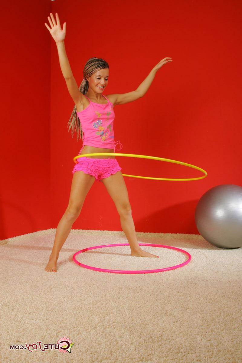 15P Pictures of teen Cute Joy playing with a hula hoop
