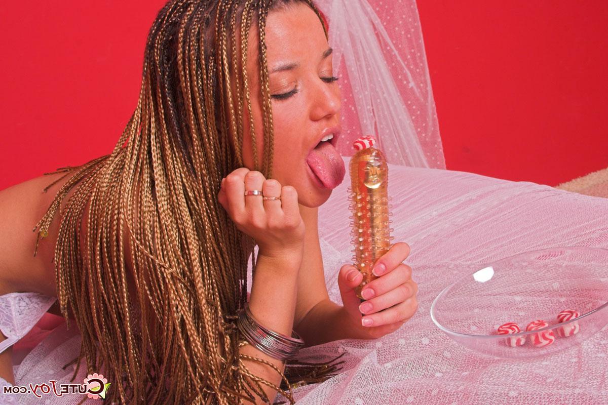 14P Pictures of Cute Joy sucking off a vibrator