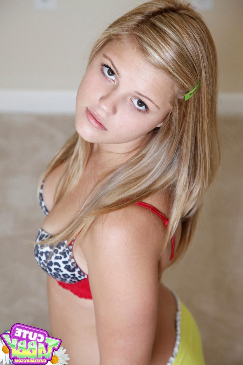 12P Pictures of blonde teen Cute Tabby showing you her perky tits