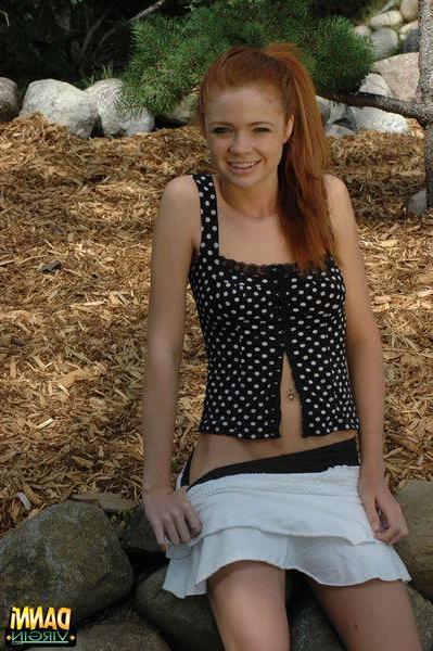20P Pictures of teen Danni Virgin looking cute outside