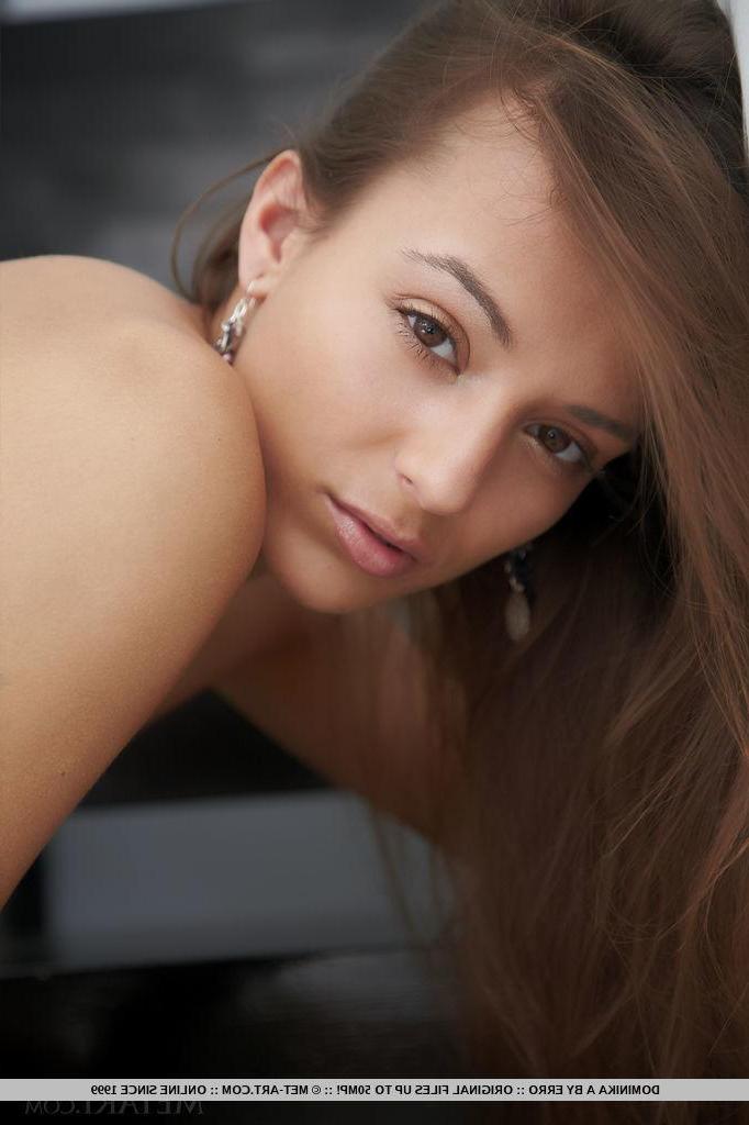 18P Brunette beauty Dominika A strips nude for you on the stairs