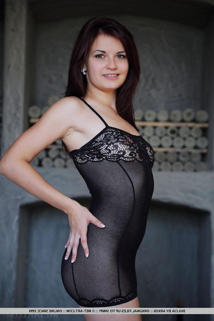 18P Brunette beauty Dulcia strips out of her black lingerie for you