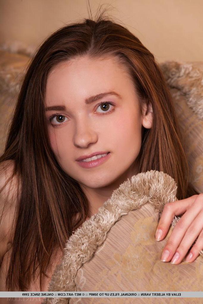 18P Brunette cutie Eliav strips nude and spreads for you in bed