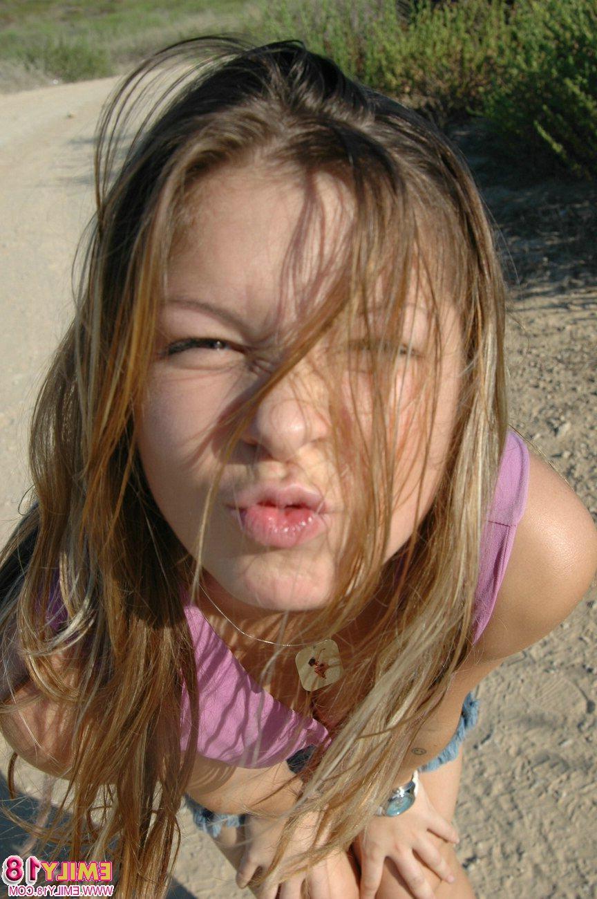 15P Cute model Emily 18 has some naughty fun on the beach
