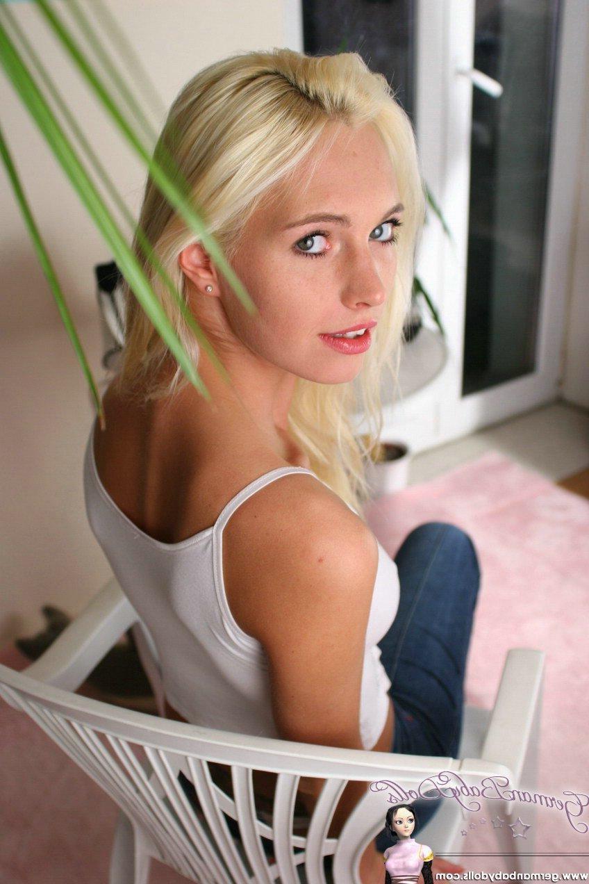 16P Pictures of blonde girl Allizee teasing the camera in a hot g-string