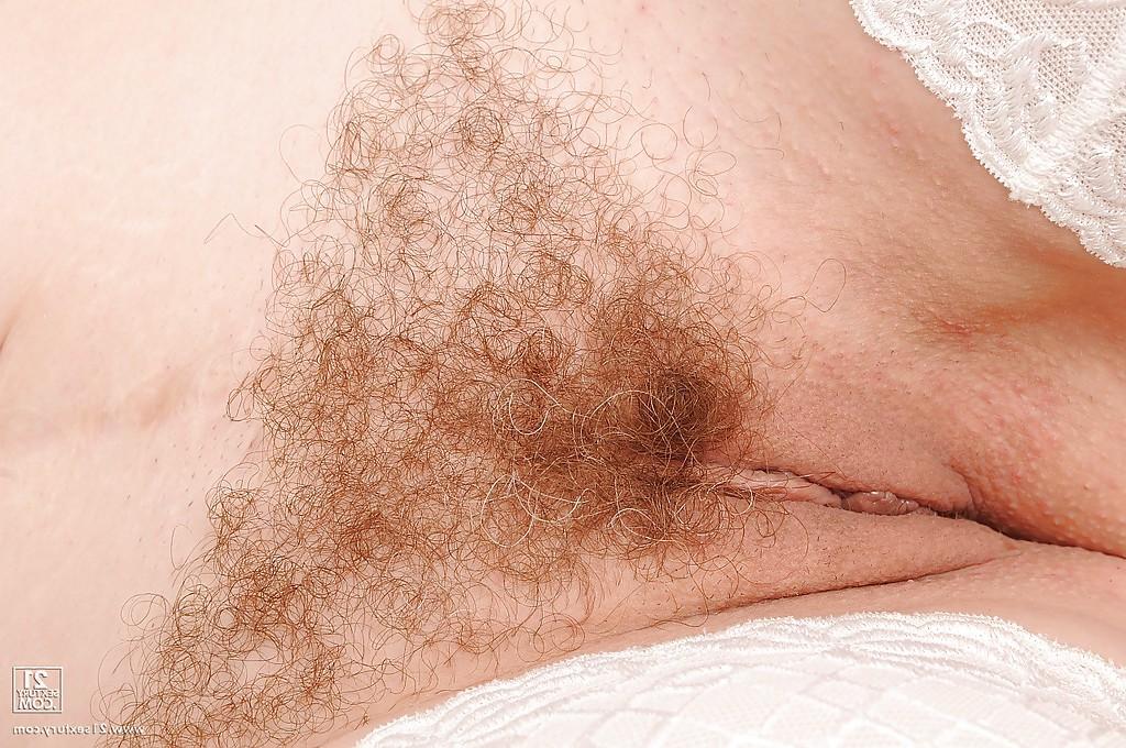 16P Mature sexy lady Eodit poses naked in stockings with her hairy pussy