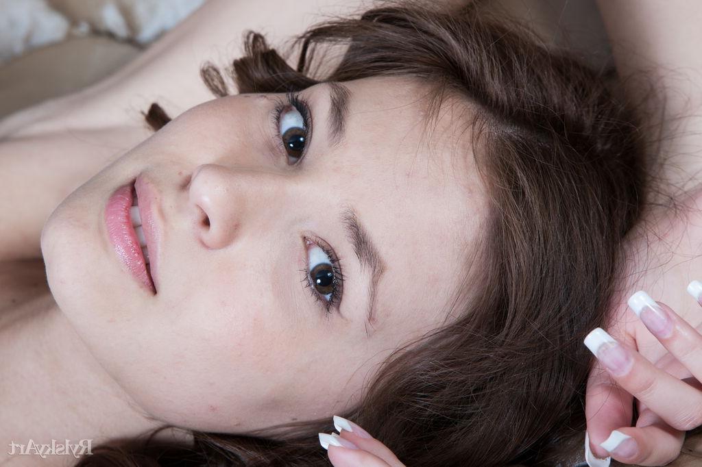 16P Brunette teen Irina J displays her nude body for you in bed