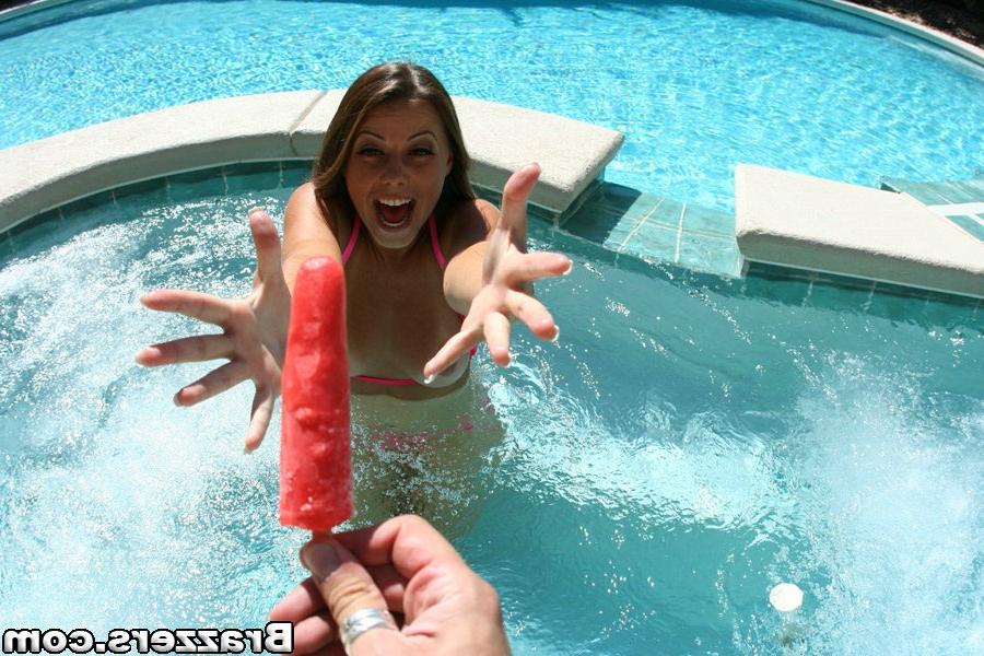 16P Nasty pornstar Penny Flame revealing her tits from bikini in the pool