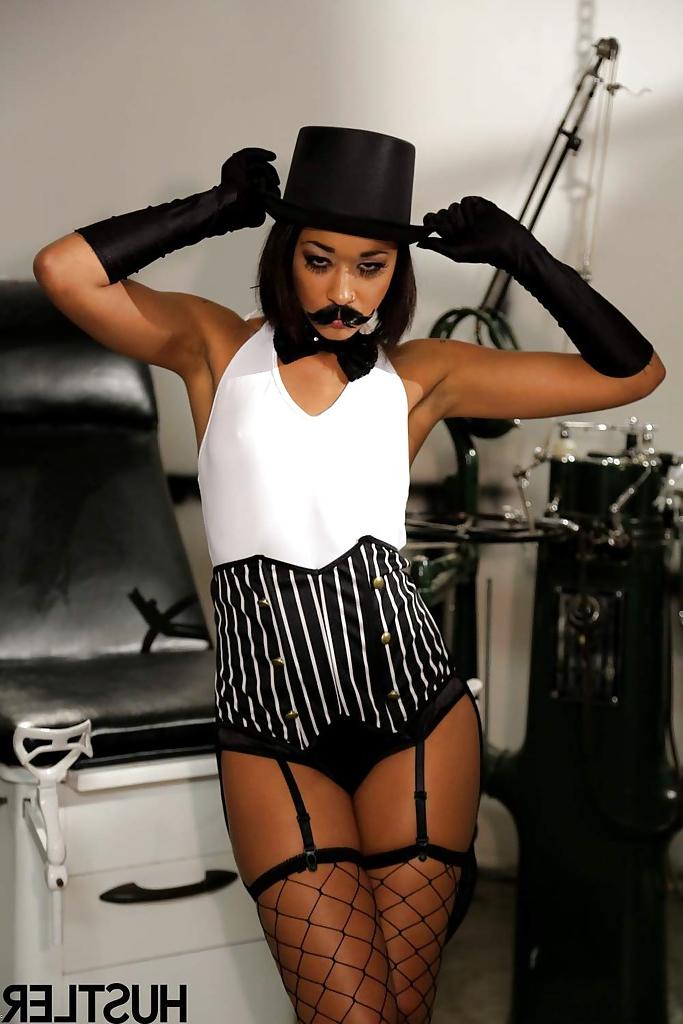 16P Ebony pornstar Skin Diamond strutting in vintage hat and long gloves