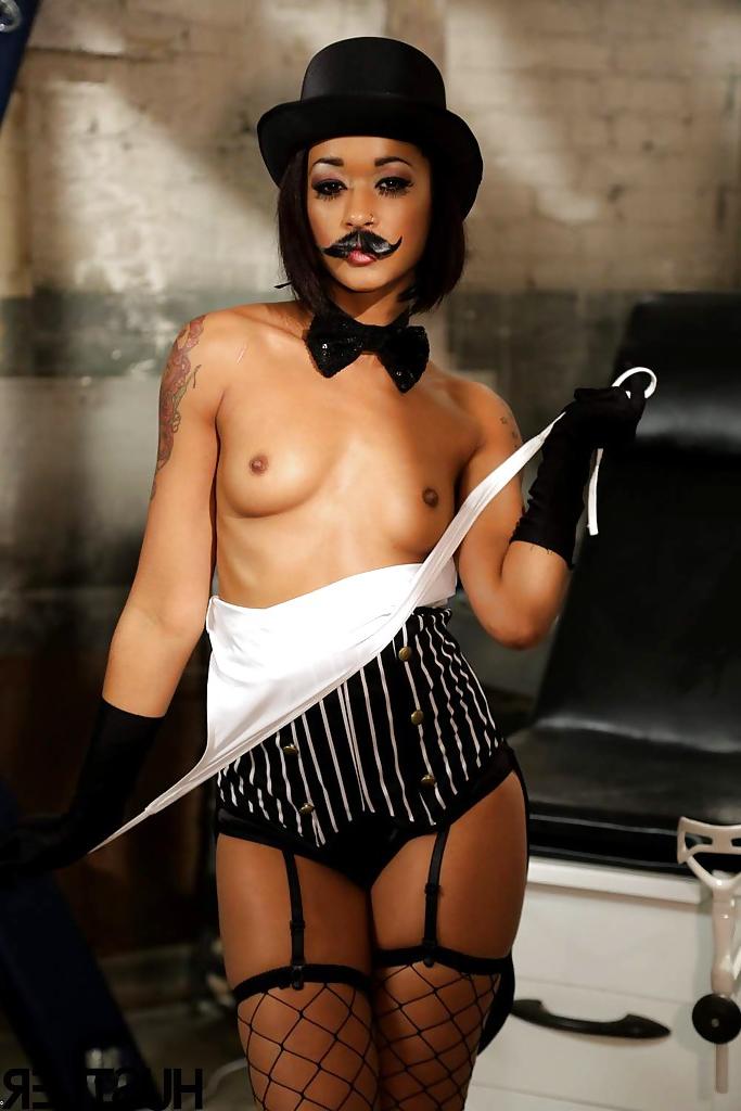 16P Ebony pornstar Skin Diamond strutting in vintage hat and long gloves