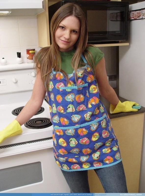 15P Josie model in the kitchen with rubber gloves and socks