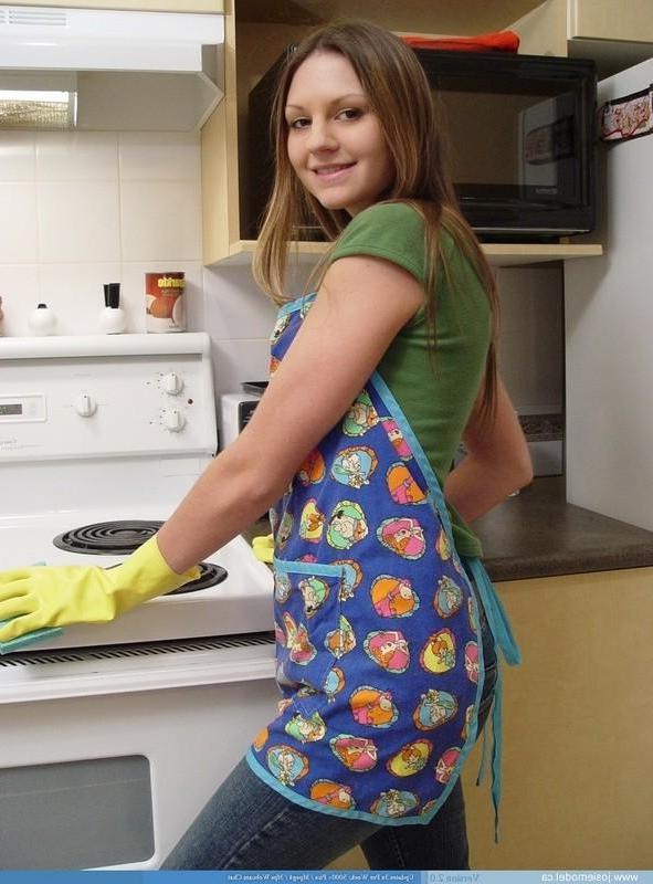 15P Josie model in the kitchen with rubber gloves and socks