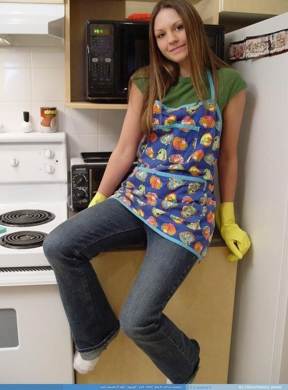 15P Josie model in the kitchen with rubber gloves and socks