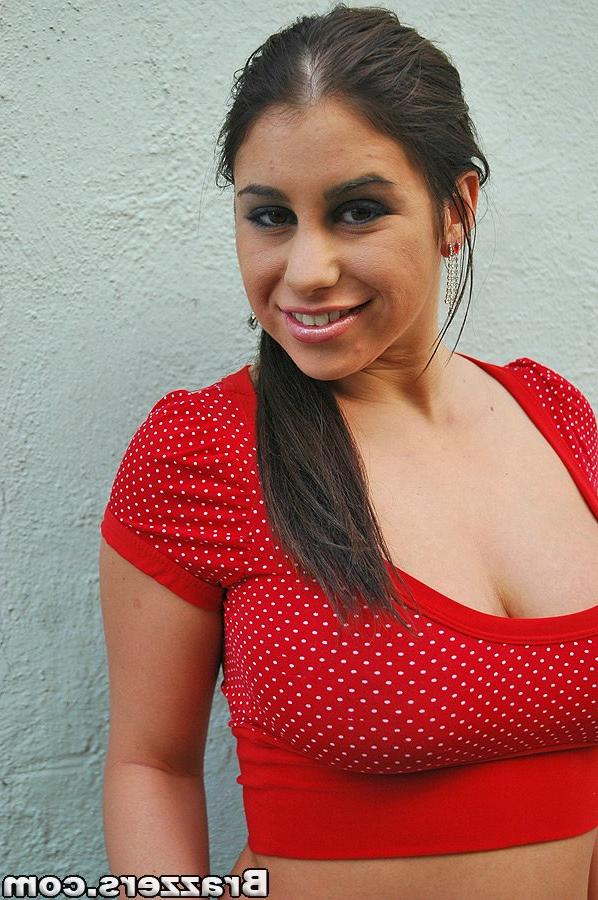 16P Hot babe in a short skirt Whitney Stevens showing her huge juggs