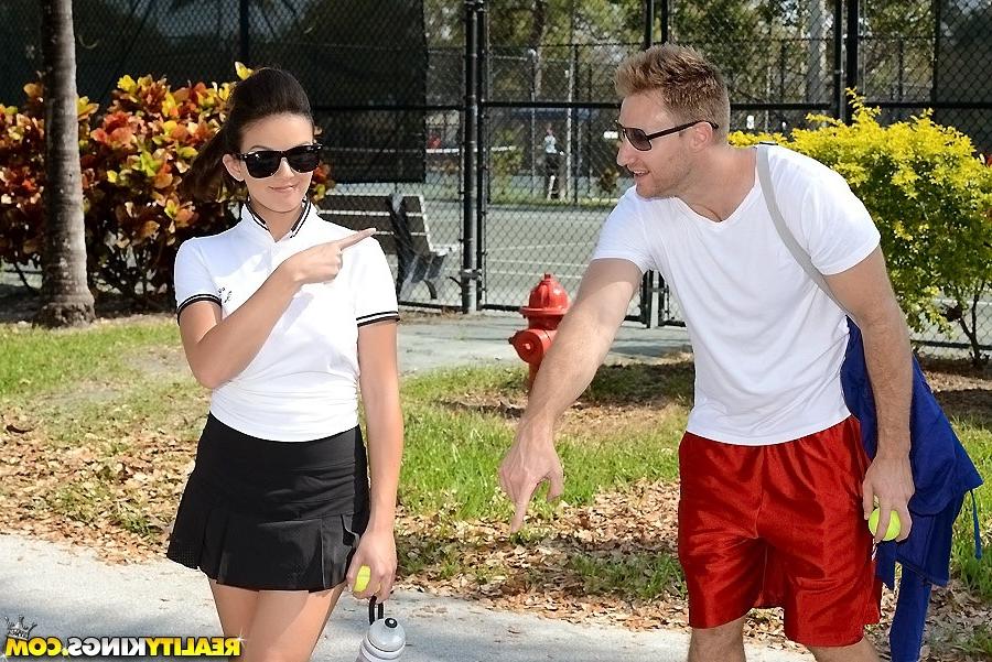 15P Skinny milf in sexy glasses Evi Foxx is playing tennis with her man