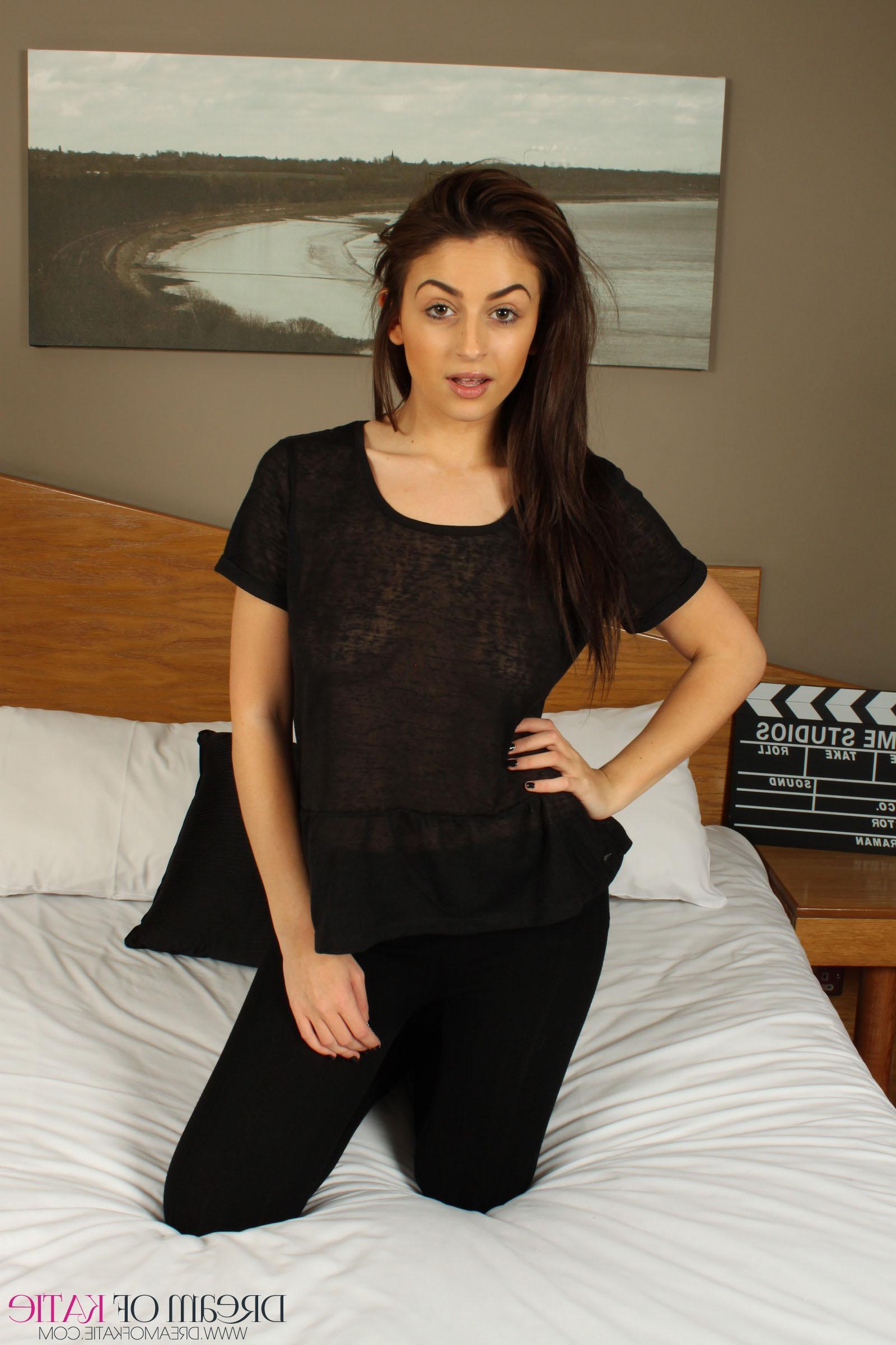 16P British babe Katie tears her shirt and pants off until she wears only her socks