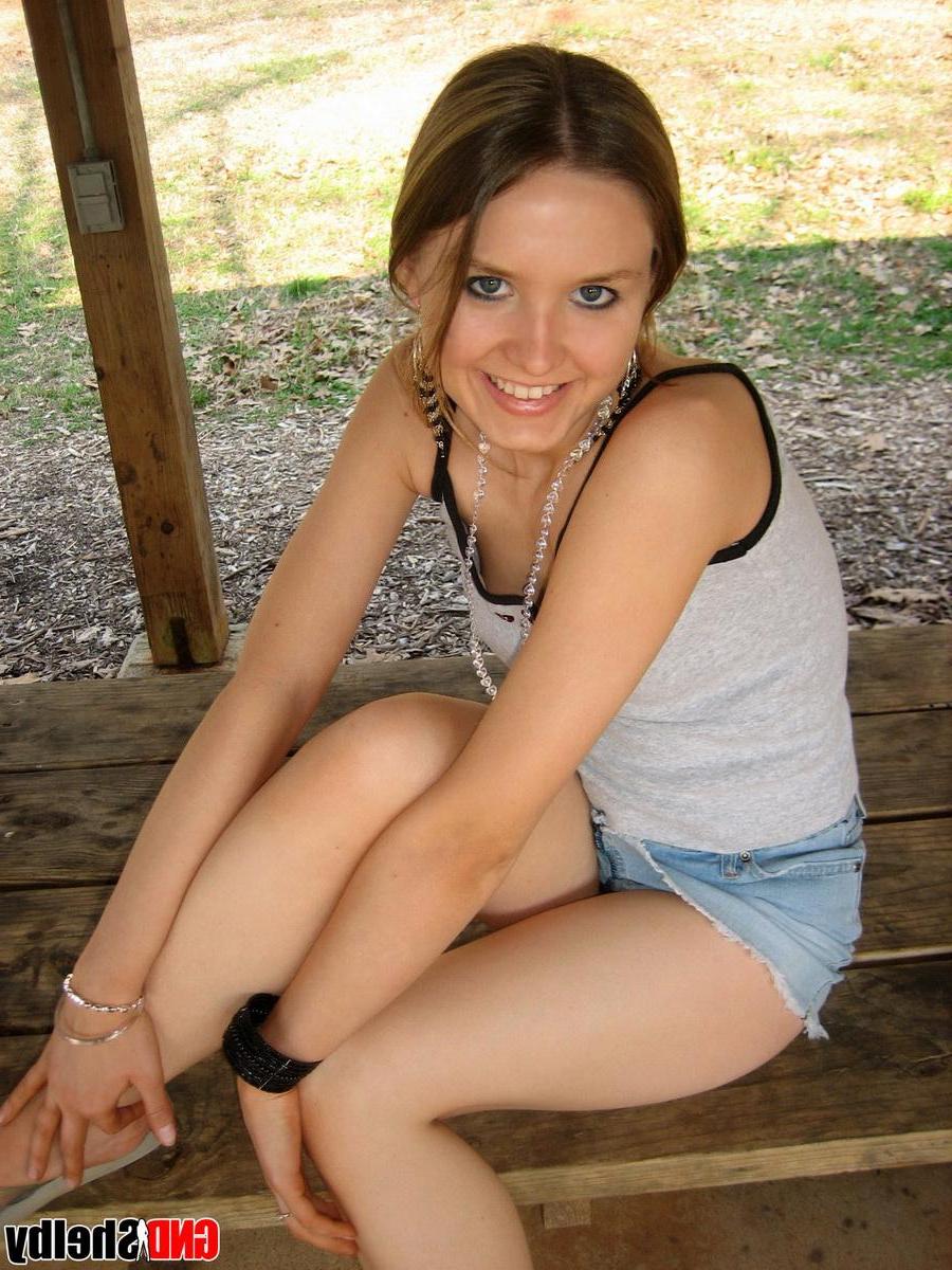 11P Cute blonde teen Shelby teases at the public park in her skimpy little outfit