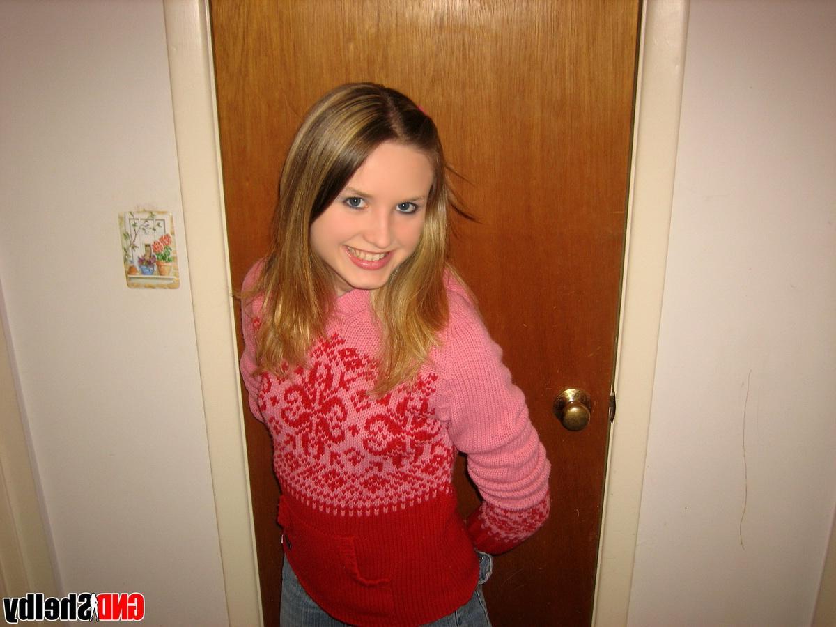 12P Cute horny teen Shelby strips out of her winter clothes and starts to finger her sweet little pussy