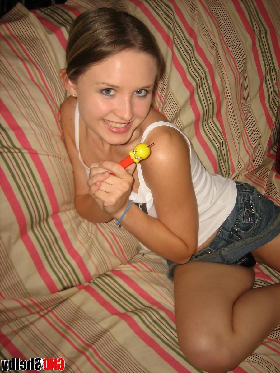 12P Cute teen Shelby teases as she strips naked and starts to finger her wet little pussy