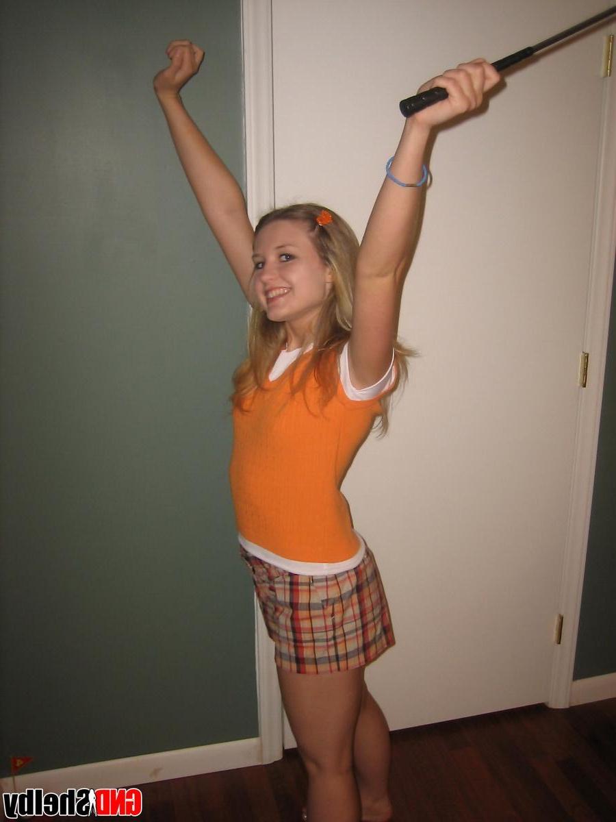 12P Cute teenie GND Shelby strips as she plays a little mini golf at home