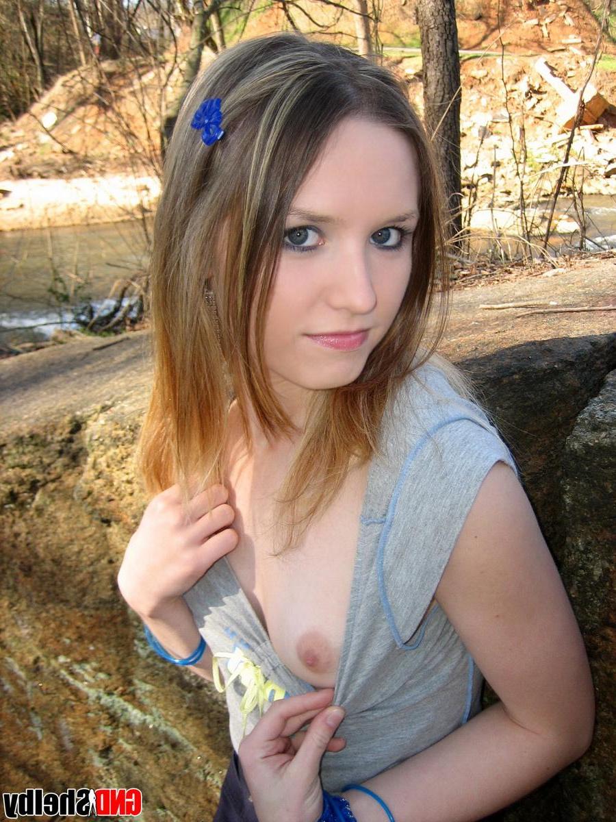 12P Cute teen Shelby flashes her perky tit while at the park down by the creek