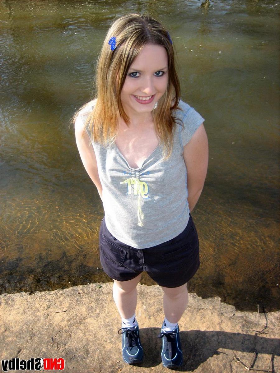 12P Cute teen Shelby flashes her perky tit while at the park down by the creek
