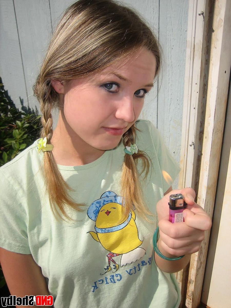 12P Cute teenage babe Shelby takes a smoke break and flashes us her perky tits