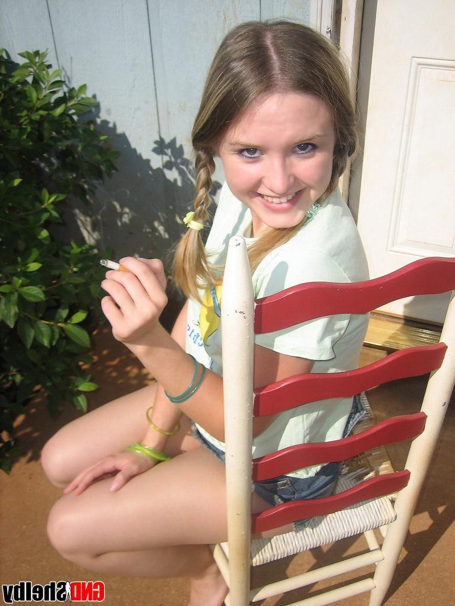 12P Cute teenage babe Shelby takes a smoke break and flashes us her perky tits